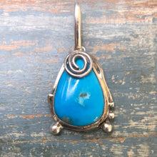 Load image into Gallery viewer, Sterling Silver swirl and stabilized Sleeping Beauty Turquoise pendant
