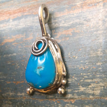 Load image into Gallery viewer, Sterling Silver swirl and stabilized Sleeping Beauty Turquoise pendant
