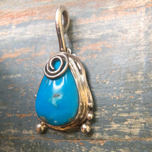 Load image into Gallery viewer, Sterling Silver swirl and stabilized Sleeping Beauty Turquoise pendant
