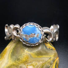 Load image into Gallery viewer, Golden Hills Turquoise and Sterling Silver sand cast bracelet
